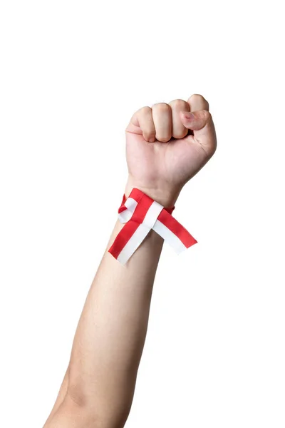 Human Hand Showing Ribbon Red White Color Indonesian Flag Isolated — Stockfoto