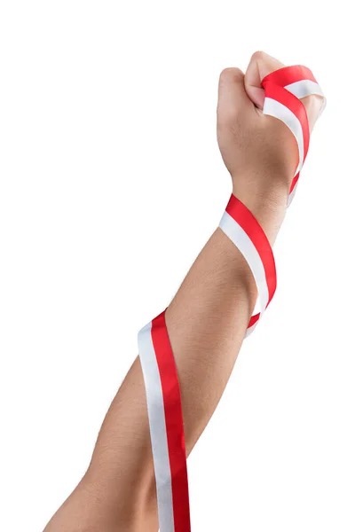 Human Hand Holding Ribbon Red White Color Indonesian Flag Isolated — ストック写真