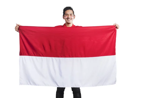 Pria Indonesia Merayakan Hari Kemerdekaan Indonesia Pada Agustus Dengan Mengibarkan — Stok Foto