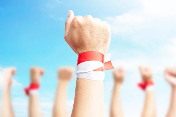 Human Hands Show Ribbon Red White Color Indonesian Flag Blue — Fotografia de Stock