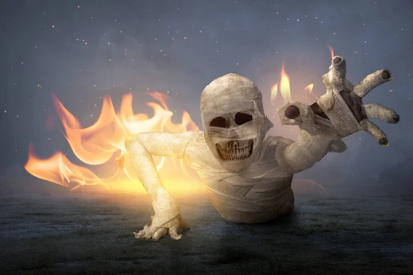 Mummy with skull head crawling with a fire background. Halloween concept