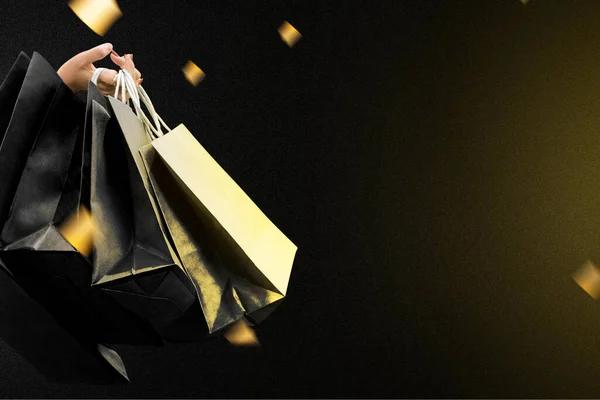 Women Hand Holding Shopping Bags Black Background Black Friday Concept — Stockfoto