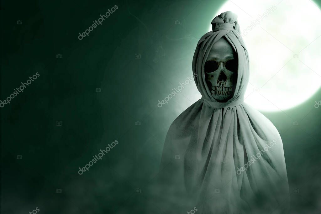 Pocong is covered with a white linen shroud standing with full moon background. Halloween concept