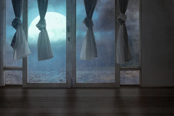 Windows with the curtain in an abandoned house with a night scene background