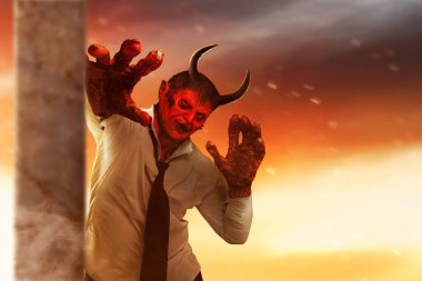 Devilman is standing in the dramatic scene background. Halloween concept