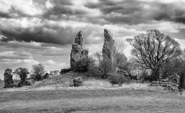 The ancient ruins of the once impressive structure and impressive ruins are situated about a mile and a half from the village of Craigie and are recognised as one of the earliest buildings in the country. A black and white architectural image.