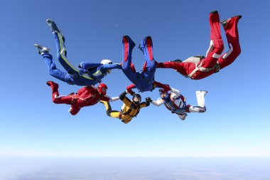 Skydivers in the sky clipart