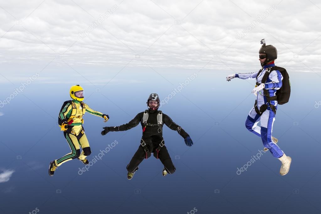 Three sports parachutist