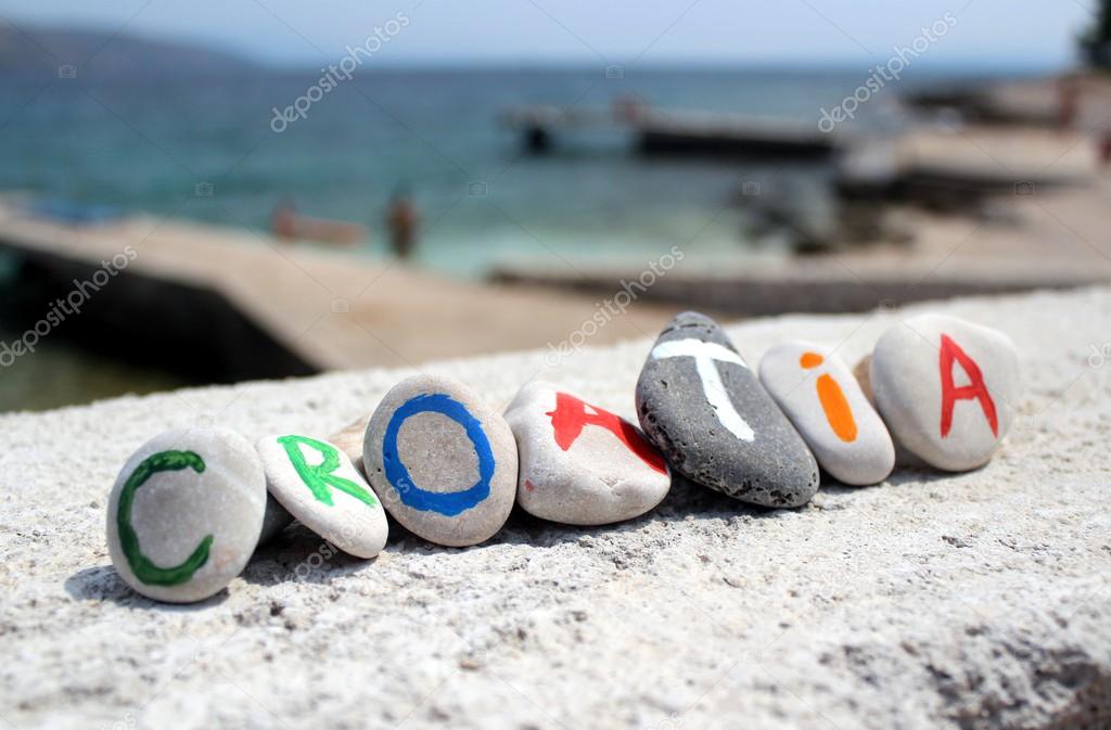 Croatia inscription on the stones with adriatic sea in the background