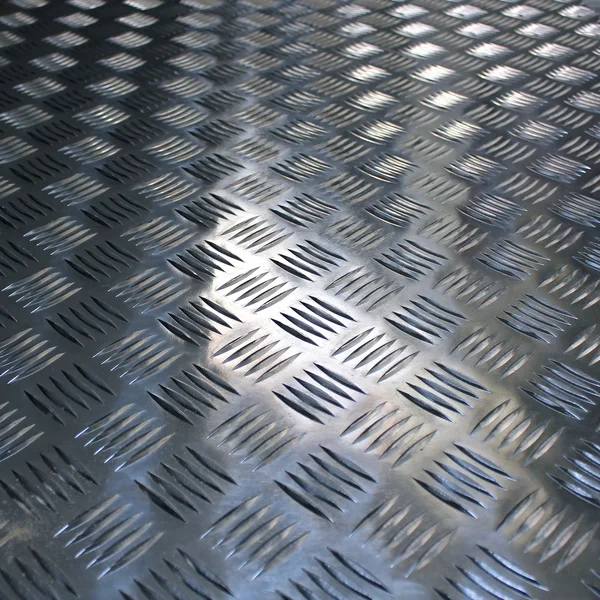 Фон из гофрированной поверхностной металлической текстуры — стоковое фото