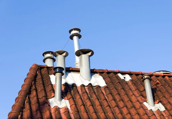 Chimneys on roof — Stock Photo, Image