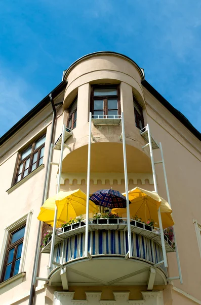 Balcony with umbrellas — Stock Photo, Image