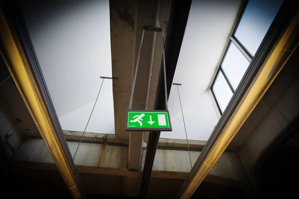 emergency exit sign in a school building