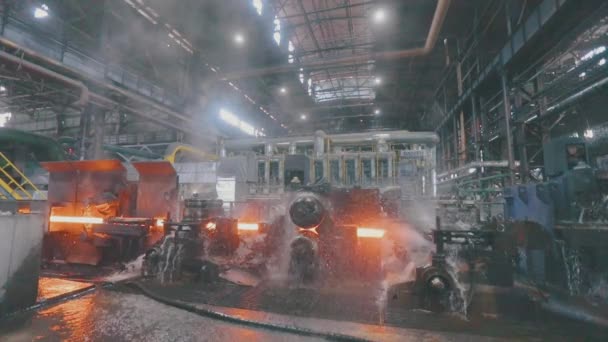 Metal production process in a metallurgical factory. Red hot metal in a modern factory. Modern metallurgical factory — Stock Video