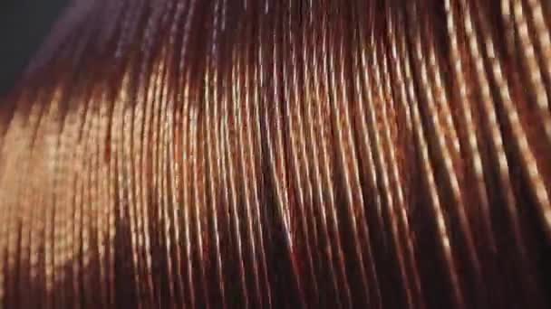 Spinning coil with copper cable close-up. Copper cable on a reel close-up — Stock Video