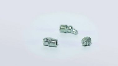 Beyaz arka planda fındıklı civata. Fındıklı cıvata beyaz arkaplanda döner