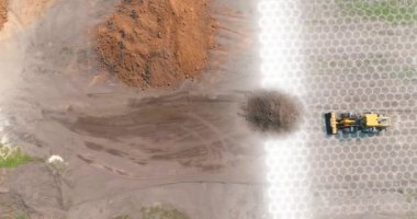 Grafikleri olan bir inşaat alanında modern buldozer. İnşaat endüstrisindeki modern teknolojilerin görselleştirilmesi. Modern buldozer, modern teknoloji görselleştirme