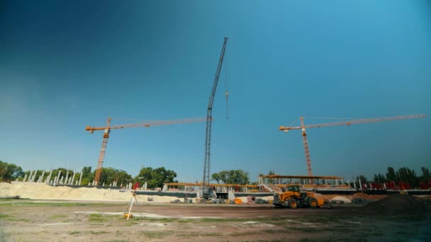 Workers make a reinforced concrete structure in time lapse. Reinforced concrete. Pouring concrete to a metal structure. Working process at a construction site. — Stock Video