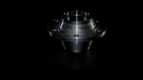 The steel hub rotates against a black background. Iron hub isolated — Stockvideo