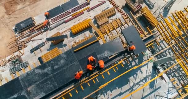 Construcción de un nuevo estadio moderno desde arriba. Sitio de construcción del nuevo estadio vista superior. — Vídeos de Stock