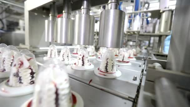 Modern production of ice cream. Automated conveyor in a factory. Modern technology at the ice cream factory — Stock Video