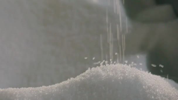 Falling polypropylene granules, slow motion. Polypropylene granules. Polypropylene granules close-up. Nonwoven Fabric Factory — Stock Video