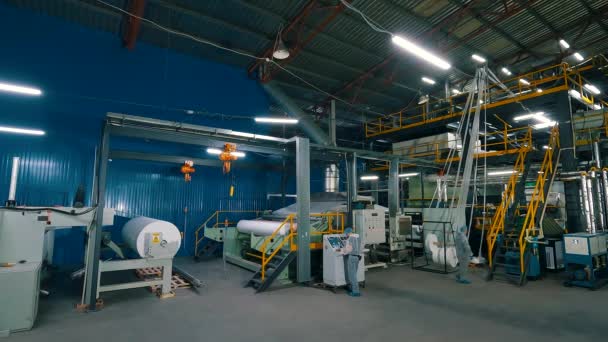 Workshop of the non-woven fabrics factory. Production of nonwoven materials. Modern shop of nonwoven materials. industrial interior — Stock Video