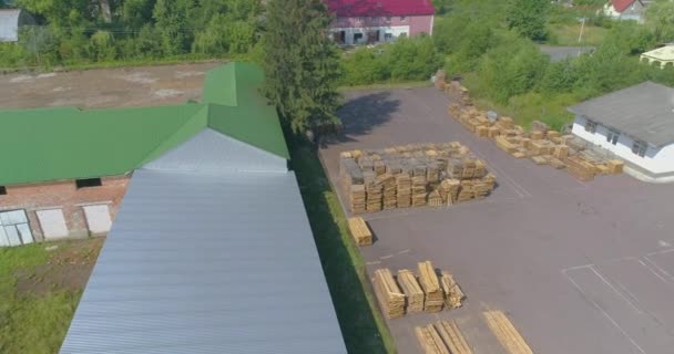 Large woodworking factory top view. Drying wood outdoors under the sun. A flight over a woodworking factory. Drying Wood Naturally. — 비디오