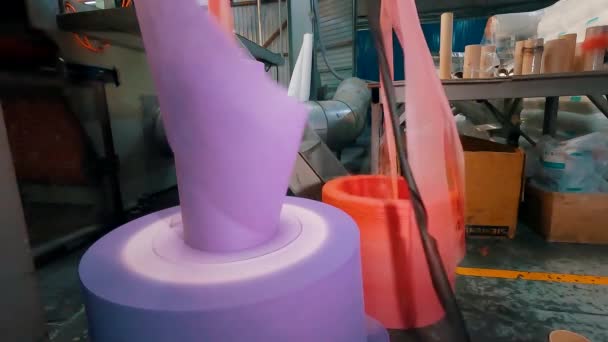 Production of nonwoven materials. Production of medical masks. Large roll of spunbond at the factory — Stock Video