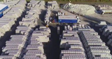 Warehouse of finished products near the factory. Large outdoor warehouse. Large warehouse near the factory.