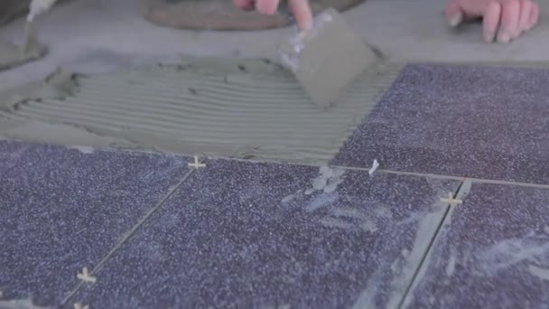 Builder Lays Tiles Cement Mortar Construction Worker Laying Tiles Floor — Vídeos de Stock