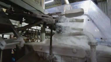 Freezing ice cream at the factory. Automatic production of ice cream. Ice cream production at the factory.