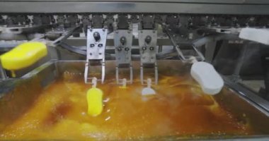 How ice cream is made. The process of making ice cream. Automated ice cream factory.