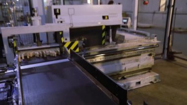 Furniture production, furniture production process, the work of modern machines in the factory.