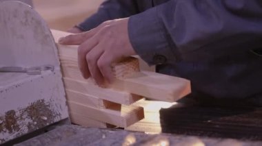 Working with hands close up, working with wood close up. Workflow in a furniture factory.