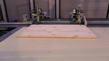 Production of furniture panels, modern furniture factory, modern conveyor line at a furniture factory.