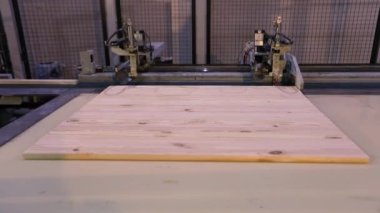 Production of furniture panels, modern furniture factory, modern conveyor line at a furniture factory.