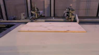 Production of furniture panels, modern furniture factory, modern conveyor line at a furniture factory.