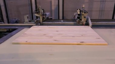 Production of furniture panels, modern furniture factory, modern conveyor line at a furniture factory.
