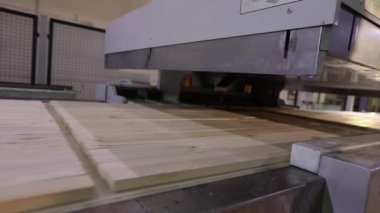 Production of furniture panels, modern furniture factory, modern conveyor line at a furniture factory.