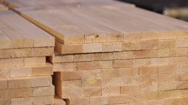 The end of the furniture board close-up, furniture board. Wooden beam with a swimming pool plan.