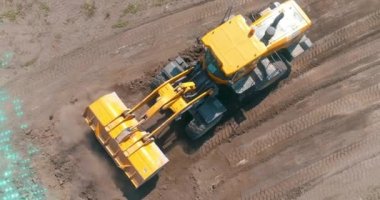 Grafikleri olan bir inşaat alanında modern buldozer. İnşaat endüstrisindeki modern teknolojilerin görselleştirilmesi. Modern buldozer, modern teknoloji görselleştirme.