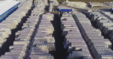 Warehouse of finished products near the factory. Large outdoor warehouse. Large warehouse near the factory.