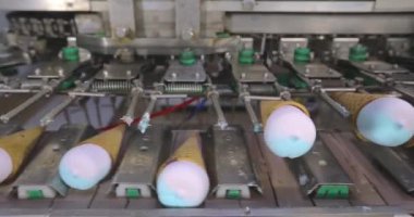 How ice cream is made. The process of making ice cream. Automated ice cream factory.