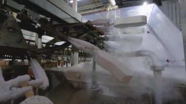 How ice cream is made. The process of making ice cream. Automated ice cream factory.