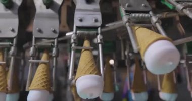 How ice cream is made. The process of making ice cream. Automated ice cream factory.