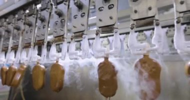 Freezing ice cream at the factory. Automatic production of ice cream. Ice cream production at the factory.