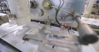 Freezing ice cream at the factory. Automatic production of ice cream. Ice cream production at the factory.