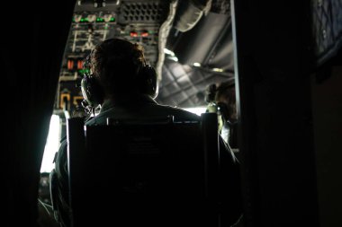 Bucharest, Romania - July 2, 2021:  A crew member of an Alenia C27J Spartan military cargo plane during a drill exercise.