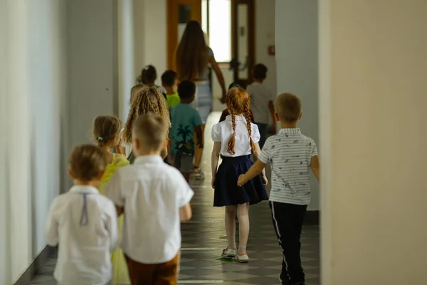 Ukrainian children start a new year of school.